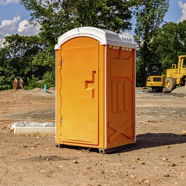 how often are the portable restrooms cleaned and serviced during a rental period in Mountain Pine